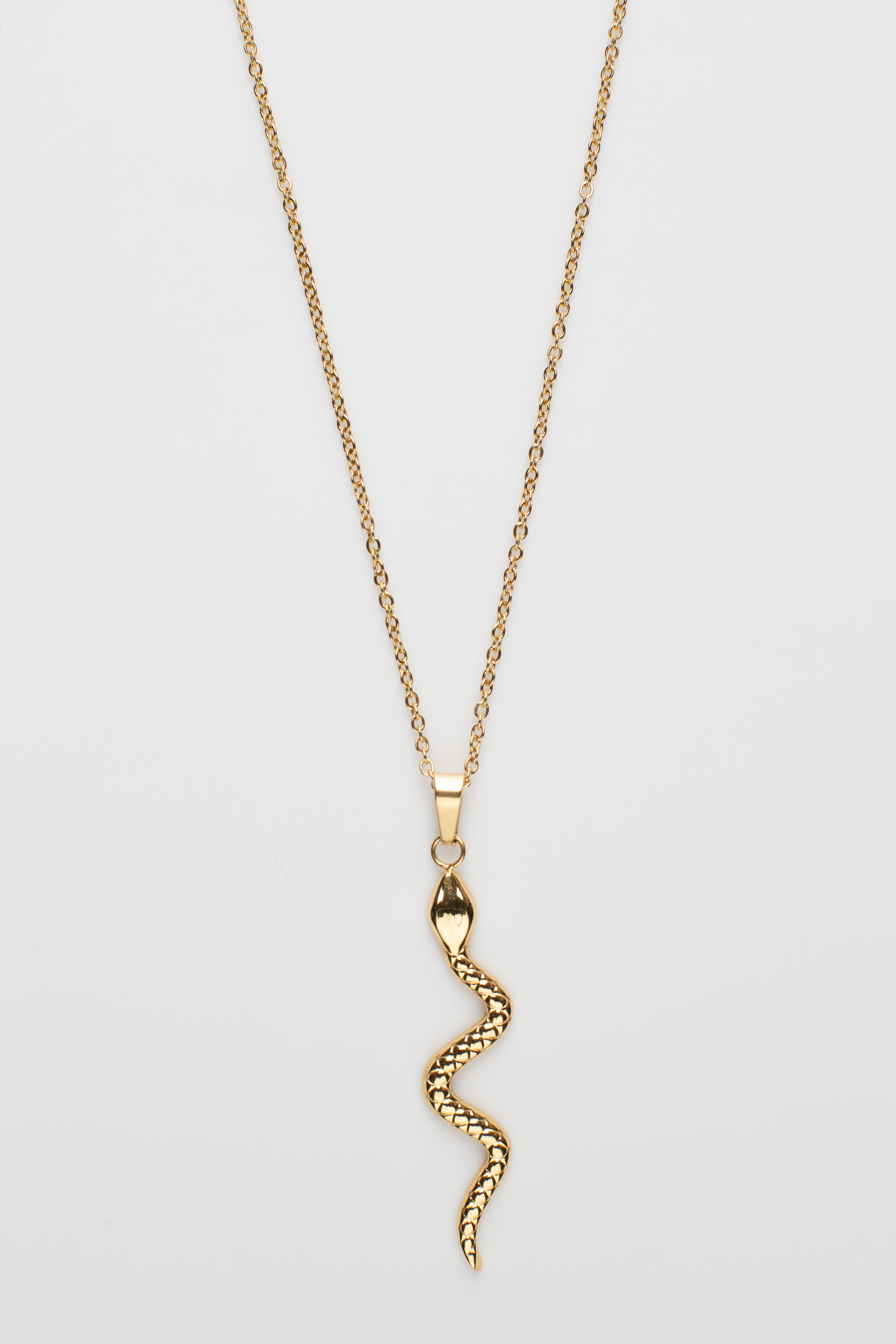 Radiant Serpentine Necklace: Vivid, Graceful Lines in Shiny Gold