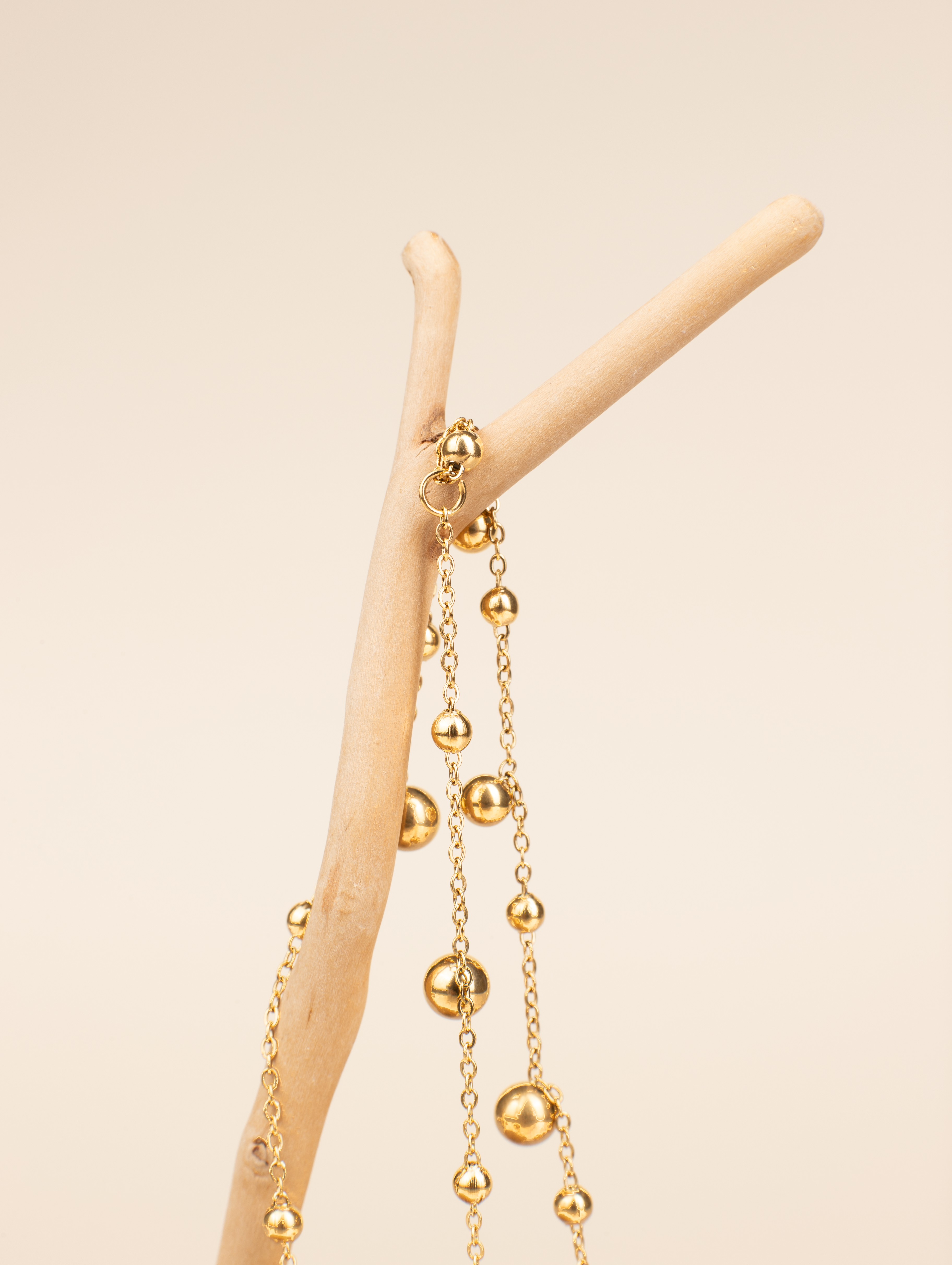 Stylish Gold Tassel Necklace - Minimalist with Gold Beads Throughout