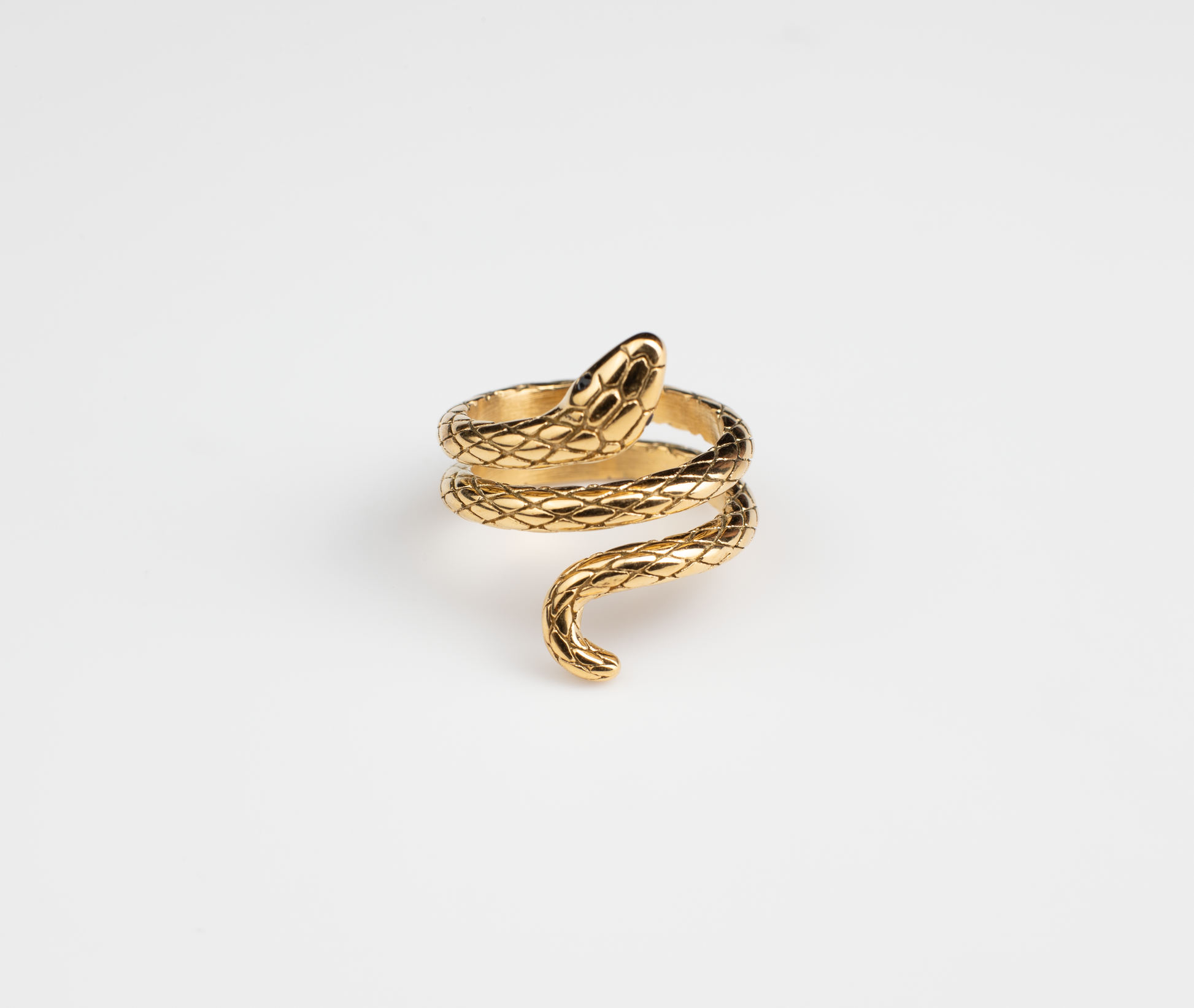 Choose between gold and silver tones with our dual-tone snake ring, featuring a lifelike coiled serpent design. Adorned with intricately carved scales and a vividly crafted snake head, plated with titanium steel plated with 18K gold, available in multiple sizes, perfect for various occasions. Embrace the heavy metal style – cool, stylish, and an excellent choice as a premium gift.