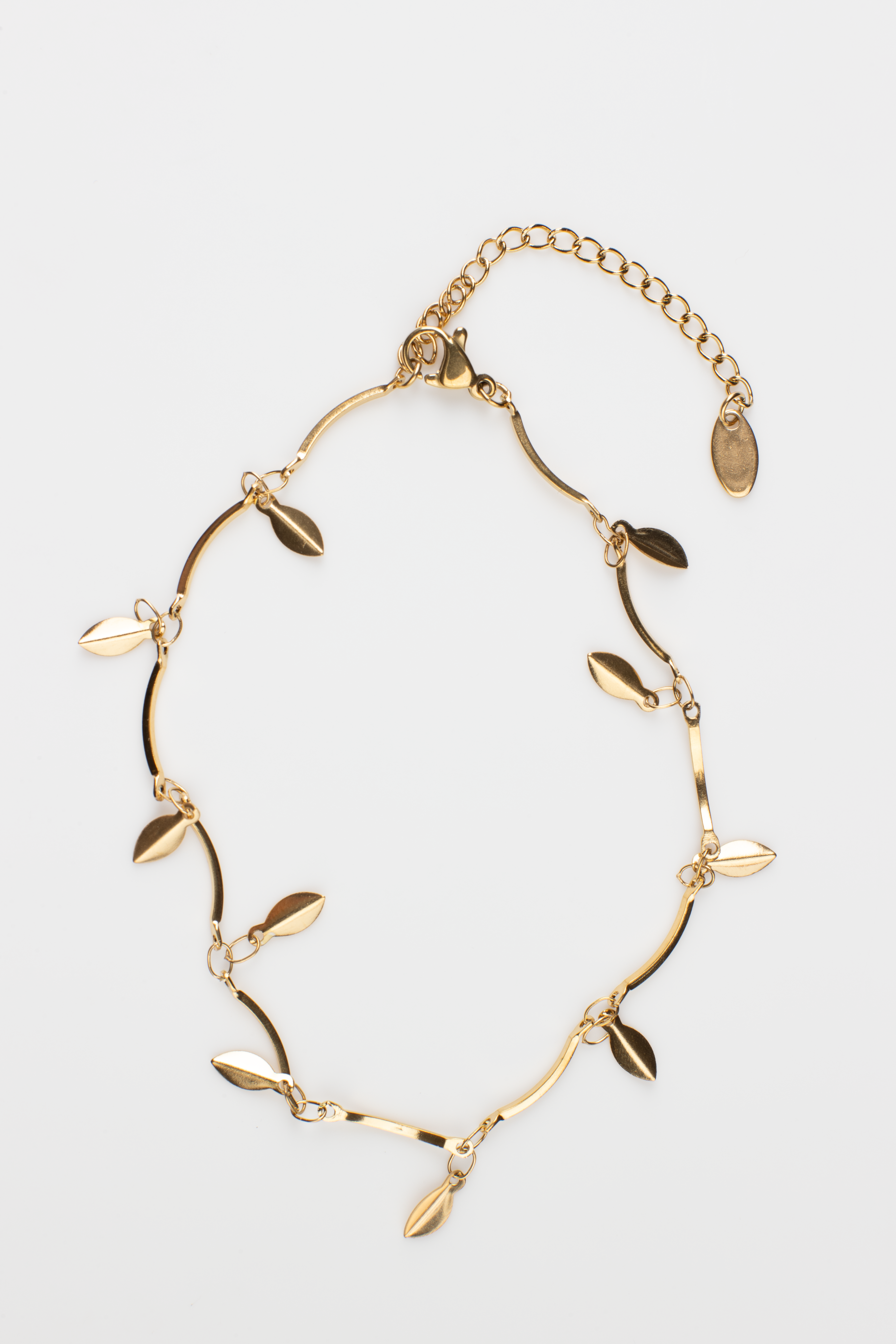 Our anklet features intricately crafted leaf charms, plated with titanium steel and 18K gold for durability and elegance. Its lightweight and simple design make it perfect for casual occasions, offering a cheerful and delicate accessory option, ideal for gifting.