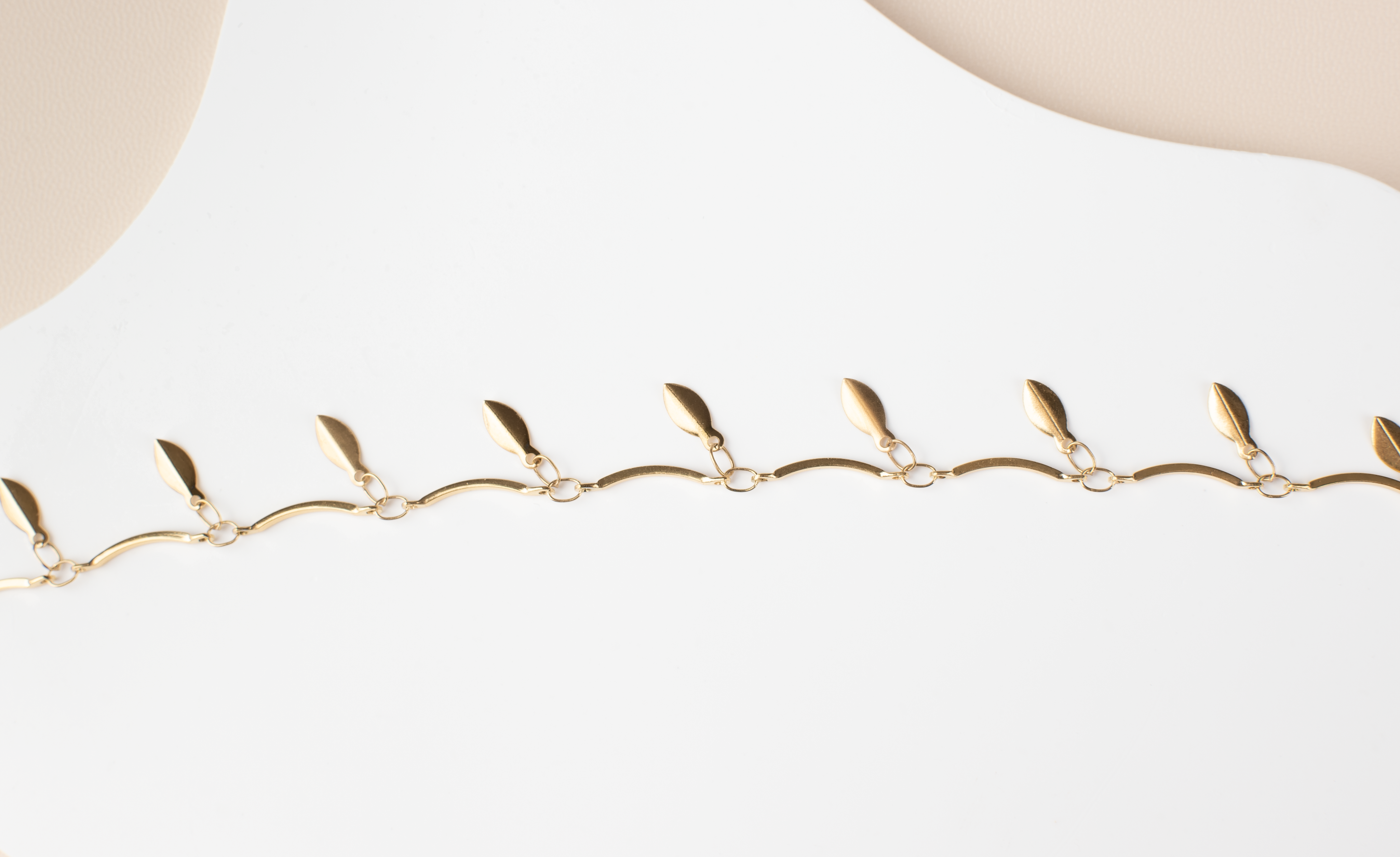 Our anklet features intricately crafted leaf charms, plated with titanium steel and 18K gold for durability and elegance. Its lightweight and simple design make it perfect for casual occasions, offering a cheerful and delicate accessory option, ideal for gifting.