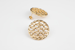 Adorn your ears with sophistication and style with our golden circular mesh hollow earrings. Crafted from titanium steel plated with 18K gold, these elegant and fashionable accessories are versatile, perfect for any occasion. Personalize your look with these exquisite earrings, designed specifically for women who appreciate timeless beauty and individuality. An ideal gift choice for those who appreciate refined elegance.